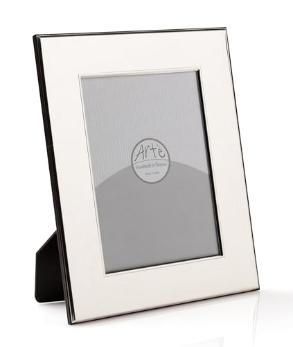 13 x 18 Bilderrahmen aus Silber mit Rückseite aus Holz, gestempelt Ag, Made in Italy. Der Rahmen hat einen Anlaufschutz 2092/13 x 18BIL 13 x 18 Bilderrahmen aus Silber mit Rückseite aus Holz, gestempelt Ag, Made in Italy. Der Rahmen hat einen Anlaufschutz 2092/13 x 18BIL von ARTÉ