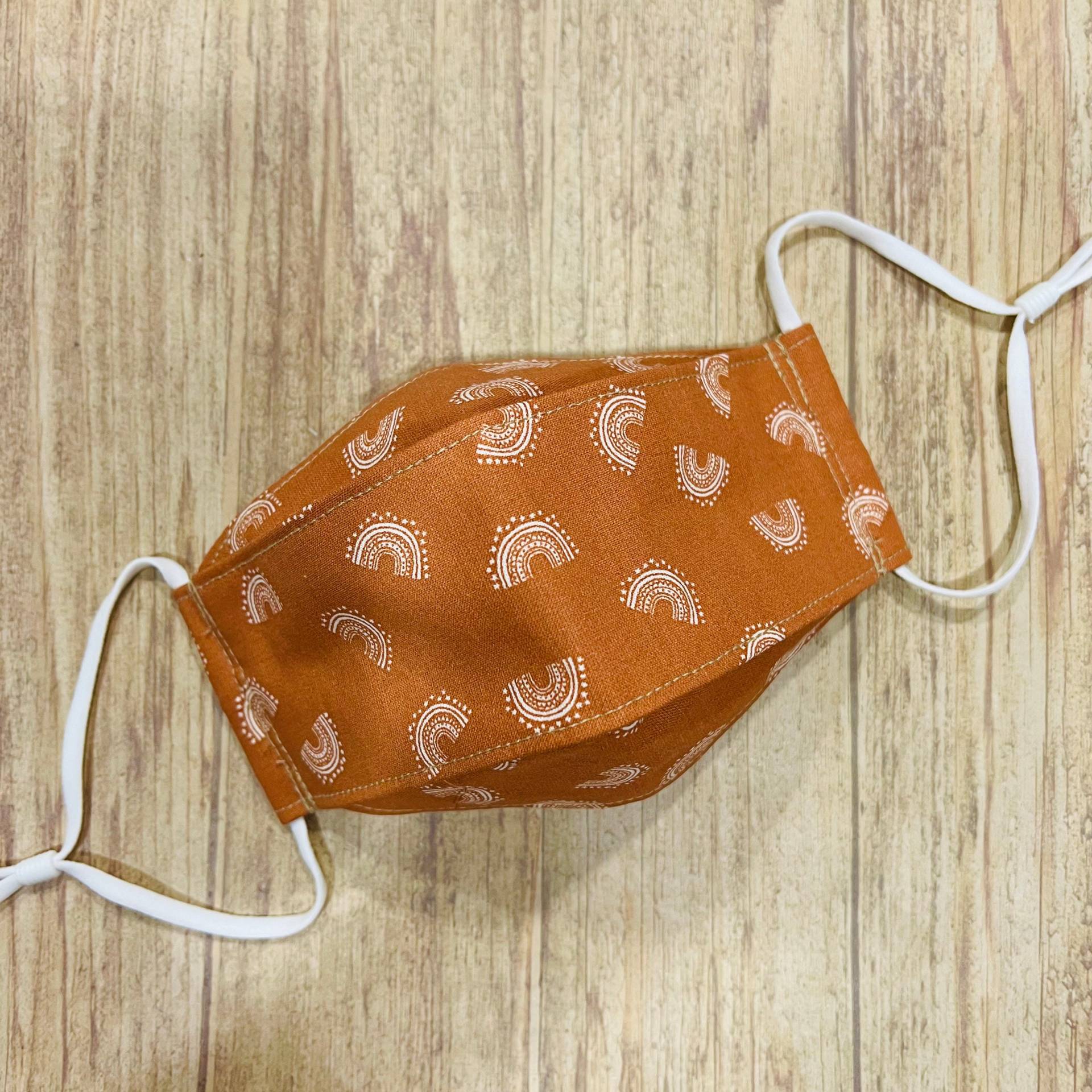 Gebrannt Orange Regenbogen Muster Print Baumwolle 3-D Gesichtsmaske Gebrannt Orange Regenbogen Muster Print Baumwolle 3-D Gesichtsmaske von Floralandleaves