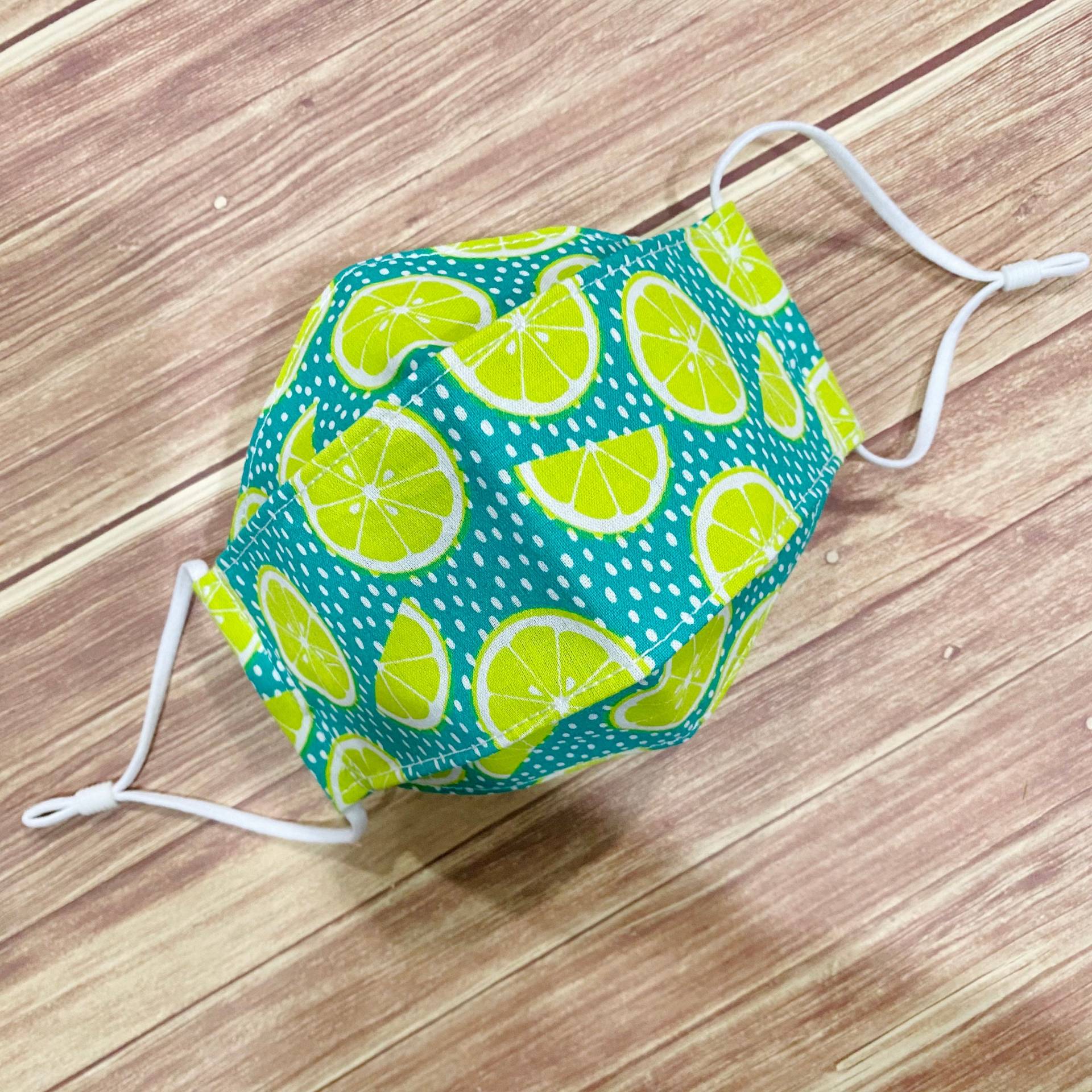 Helle Lime Print Baumwolle 3-D Gesichtsmaske Helle Lime Print Baumwolle 3-D Gesichtsmaske von Floralandleaves