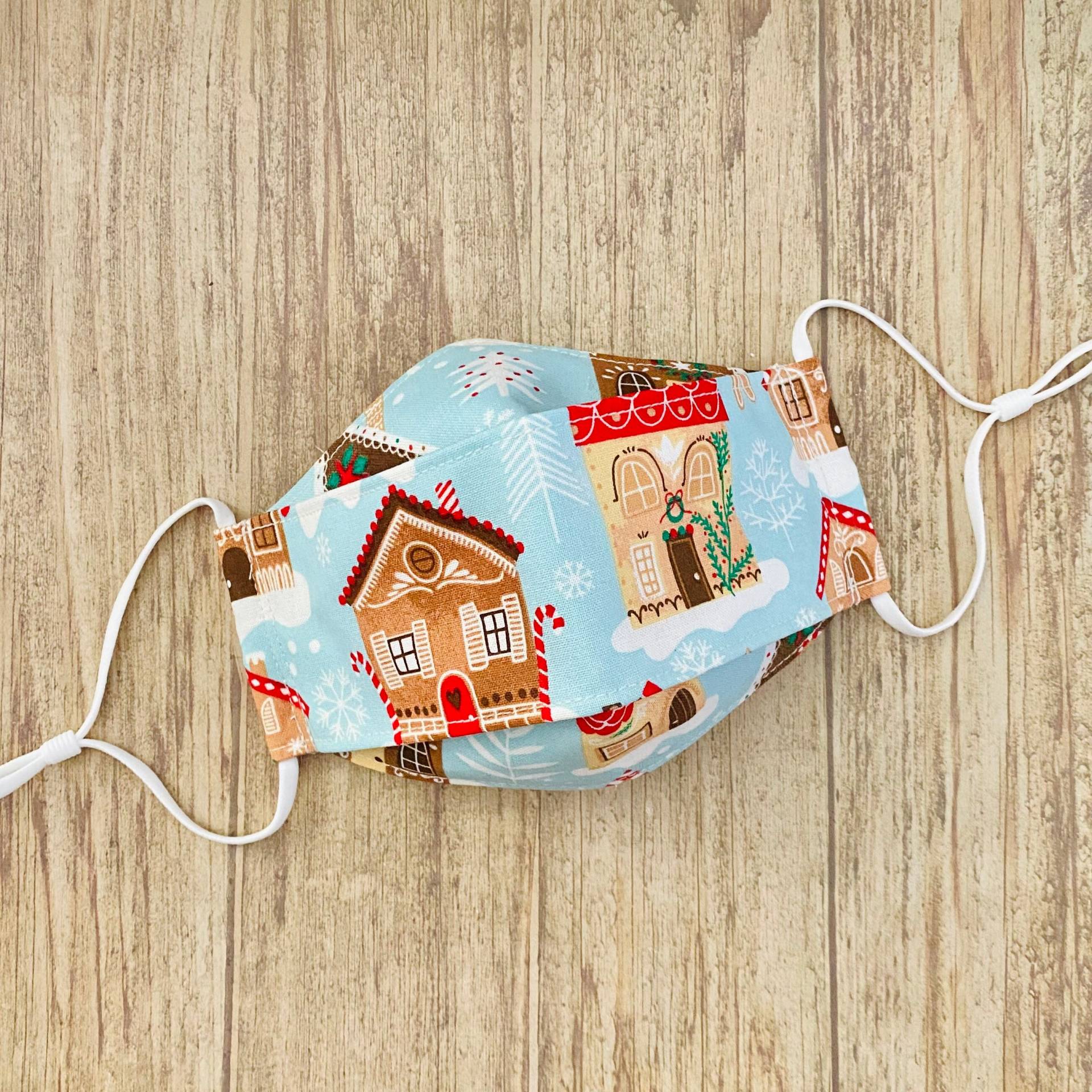 Winter Fun Christmas "Lebkuchenhaus" Print Baumwolle 3-D Gesichtsmaske Winter Fun Christmas "Lebkuchenhaus" Print Baumwolle 3-D Gesichtsmaske von Floralandleaves