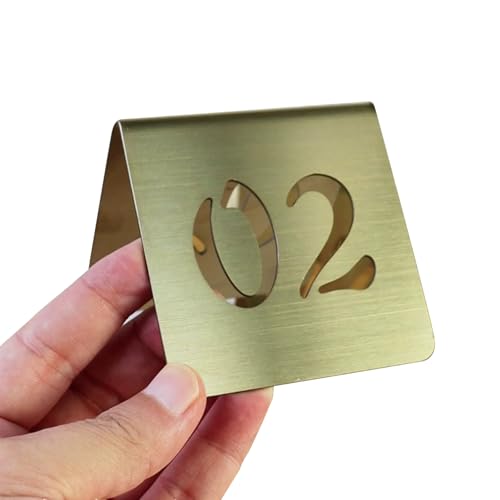 Edelstahl Zelttischnummern 1-50 doppelseitige selbststehende Karten für Restaurant Café Bankett stapelbare Tischkarten Gold 8cm Design Edelstahl Zelttischnummern 1-50 doppelseitige selbststehende Karten für Restaurant Café Bankett stapelbare Tischkarten Gold 8cm Design von Generisch