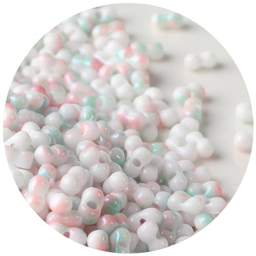 Glasperlen in Erdnussform, 3 x 6 mm, Abstandshalter, Farbverlauf, zum Basteln, Rocailles, Rosa und Grün, 108 Stück von Globellapro