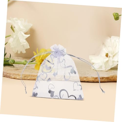 Holibanna 100stücke Transparente Organzabeutel Mit Kordelzug Für Hochzeiten Partys Gastgeschenke Zum Verpacken Von Schmuck Süßigkeiten Und Partyzubehör Mit Herzmotiv Holibanna 100stücke Transparente Organzabeutel Mit Kordelzug Für Hochzeiten Partys Gastgeschenke Zum Verpacken Von Schmuck Süßigkeiten Und Partyzubehör Mit Herzmotiv von Holibanna