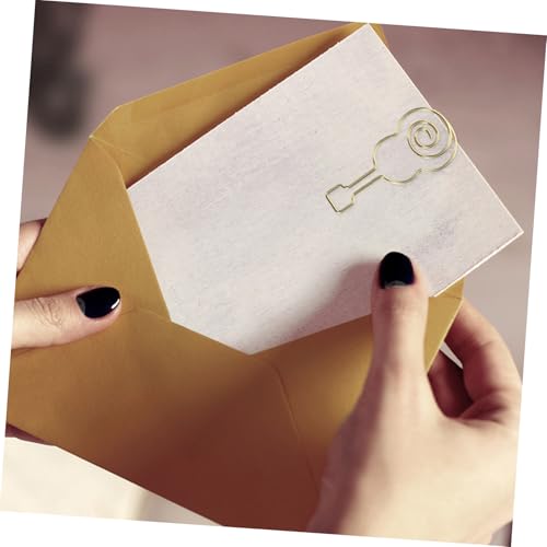 Holibanna 50 Stück Büroklammern in Musiknotenform aus Metall Kleine Dekorative Papierclips für Büro Schule und Akten Praktische Datei und Dokumentenhalter in Gold Holibanna 50 Stück Büroklammern in Musiknotenform aus Metall Kleine Dekorative Papierclips für Büro Schule und Akten Praktische Datei und Dokumentenhalter in Gold von Holibanna