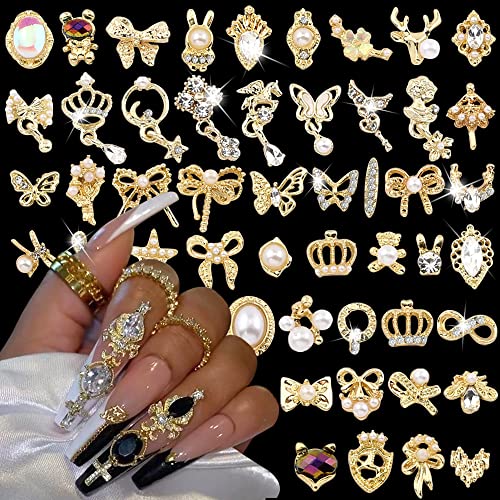 50pcs Gold Nail Charms Luxus Strasssteine Nägel Edelsteine 3D Legierung Blume Schmetterling Nail Art Charms Metall Nagel Schmuck Kawaii Bär Herz Bogen Stern Schlange Glitzersteine Nageldesign Zubehör von Jaliya