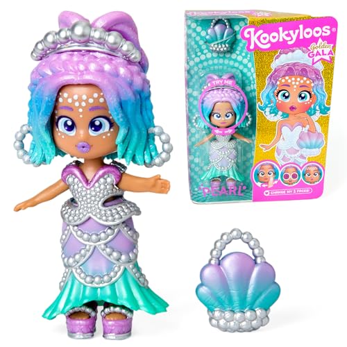 KOOKYLOOS Golden Gala Pearl Series, Sammelpuppe aus der Golden Gala SerieEnthält die Kookyloos Puppe Pearl, 1 Tasche, modische Kleidung und Schuhe und 1 Accessoire.1 Puppe, 3 Verschiedene Gesichter von KOOKYLOOS