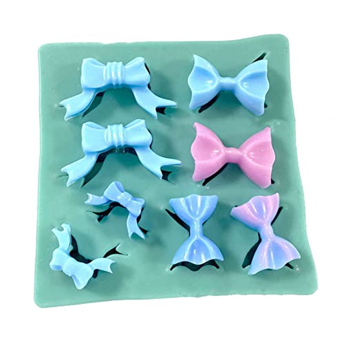 Mini-Silikonform mit Herz-Schleife, handgefertigt, für Kerzen, Seife, Backen, Fondant, Schokolade, Hochzeitstorte Mini-Silikonform mit Herz-Schleife, handgefertigt, für Kerzen, Seife, Backen, Fondant, Schokolade, Hochzeitstorte von Kalttoy