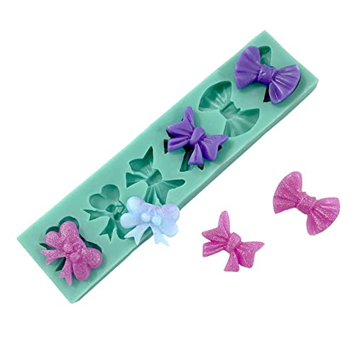 Mini-Silikonform mit Herz-Schleife, handgefertigt, für Kerzen, Seife, Backen, Fondant, Schokolade, Hochzeitstorte Mini-Silikonform mit Herz-Schleife, handgefertigt, für Kerzen, Seife, Backen, Fondant, Schokolade, Hochzeitstorte von Kalttoy