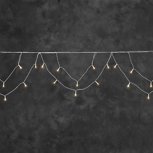 Konstsmide LED Dachrinnenlichterkette, Bogenform, 96 bernsteinfarbene Dioden, 24V Außentrafo, weißes Kabel - 2748-802 Konstsmide LED Dachrinnenlichterkette, Bogenform, 96 bernsteinfarbene Dioden, 24V Außentrafo, weißes Kabel - 2748-802 von Konstsmide