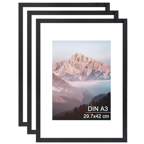 OMISHE 3er Pack Massivholz Bilderrahmen A3 29,7x42 cm, Schwarzer Bilderrahmen DIN A3 mit A4 Passepartout und Plastikhülle, Holz A3 Bilderrahmen für Wand, Rahmen DIN A3, Schwarz, 3er Pack OMISHE 3er Pack Massivholz Bilderrahmen A3 29,7x42 cm, Schwarzer Bilderrahmen DIN A3 mit A4 Passepartout und Plastikhülle, Holz A3 Bilderrahmen für Wand, Rahmen DIN A3, Schwarz, 3er Pack von OMISHE