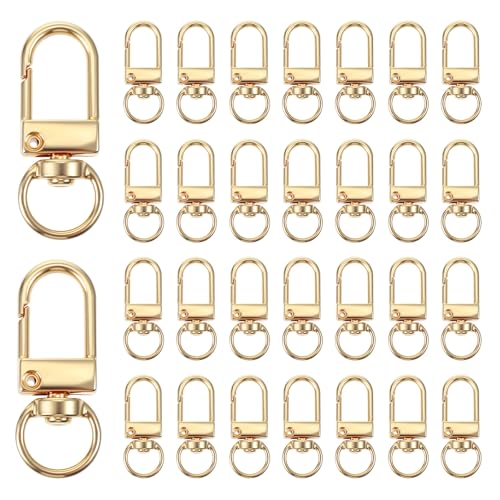 Ouligay 50 Stück Mini Karabiner Drehbar Schlüsselanhänger Gold Karabinerhaken mit Drehgelenk Metall Karabinerverschlüsse 360° Drehbare Karabinerhaken Klein Gold für DIY Taschen Schlüsselring Stecker Ouligay 50 Stück Mini Karabiner Drehbar Schlüsselanhänger Gold Karabinerhaken mit Drehgelenk Metall Karabinerverschlüsse 360° Drehbare Karabinerhaken Klein Gold für DIY Taschen Schlüsselring Stecker von Ouligay