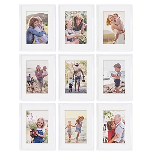 PHOTOLINI Bilderrahmen 30x40 Weiss Holz MDF, 9er Set Bilderrahmen 40x30 cm mit Passepartout, bruchsicheres Acrylglas, Rahmen 30 x 40 zum Aufhängen, extra Zubehör - Rahmen 30x40 für Fotos & Poster PHOTOLINI Bilderrahmen 30x40 Weiss Holz MDF, 9er Set Bilderrahmen 40x30 cm mit Passepartout, bruchsicheres Acrylglas, Rahmen 30 x 40 zum Aufhängen, extra Zubehör - Rahmen 30x40 für Fotos & Poster von PHOTOLINI