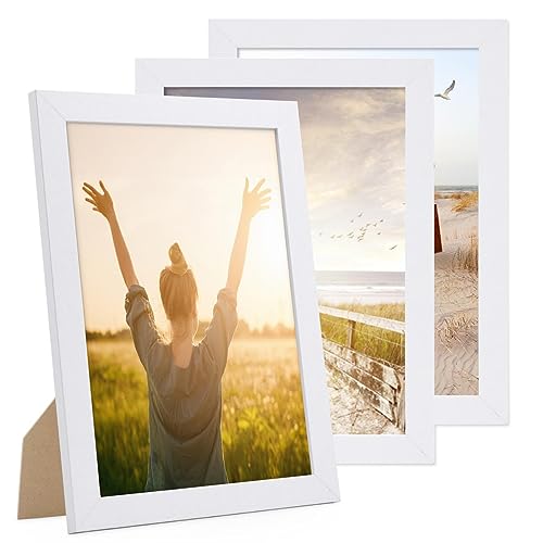PHOTOLINI Bilderrahmen A4 Weiss Holz MDF, breiter DIN A4 Bilderrahmen 3er Set 21x30 weiß, Rahmen 21x30 din a 4 mit Acrylglas, picture frame zum Aufhängen & Aufstellen, Bilder Rahmen 30x21 mit Zubehör PHOTOLINI Bilderrahmen A4 Weiss Holz MDF, breiter DIN A4 Bilderrahmen 3er Set 21x30 weiß, Rahmen 21x30 din a 4 mit Acrylglas, picture frame zum Aufhängen & Aufstellen, Bilder Rahmen 30x21 mit Zubehör von PHOTOLINI
