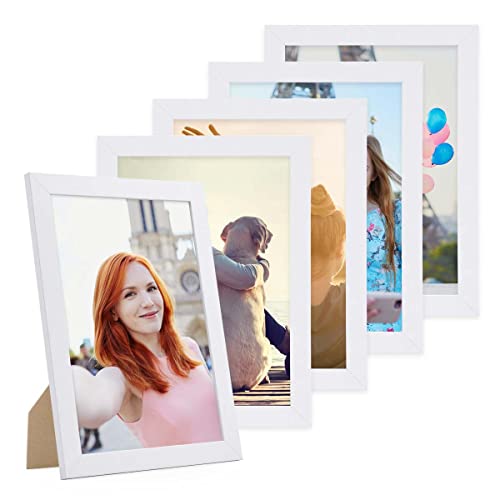PHOTOLINI Bilderrahmen A4 Set Weiss Holz MDF, 5er Set breite DIN A4 Bilderrahmen 21x30 weiß, bruchsicheres Acrylglas, picture frame zum Aufhängen & Aufstellen, Bilder Rahmen 30x21 mit Zubehör PHOTOLINI Bilderrahmen A4 Set Weiss Holz MDF, 5er Set breite DIN A4 Bilderrahmen 21x30 weiß, bruchsicheres Acrylglas, picture frame zum Aufhängen & Aufstellen, Bilder Rahmen 30x21 mit Zubehör von PHOTOLINI