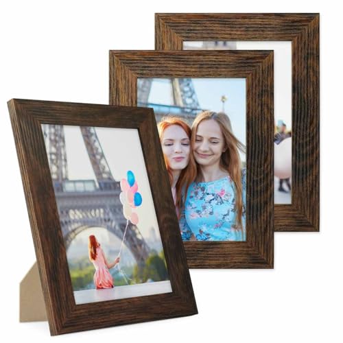 PHOTOLINI Bilderrahmen 10x15 cm MDF-Holz Eiche Dunkel, breite Rahmen, 3er Set, modern, bruchsicheres Acrylglas, zum Aufhängen & Aufstellen, extra Zubehör - für Ihre stilvolle Wanddekoration PHOTOLINI Bilderrahmen 10x15 cm MDF-Holz Eiche Dunkel, breite Rahmen, 3er Set, modern, bruchsicheres Acrylglas, zum Aufhängen & Aufstellen, extra Zubehör - für Ihre stilvolle Wanddekoration von PHOTOLINI