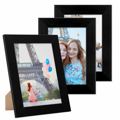 PHOTOLINI Bilderrahmen 10x15 cm Schwarz MDF-Holz, breite Rahmen, 3er Set, modern, bruchsicheres Acrylglas, zum Aufhängen & Aufstellen, extra Zubehör - für Ihre stilvolle Wanddekoration PHOTOLINI Bilderrahmen 10x15 cm Schwarz MDF-Holz, breite Rahmen, 3er Set, modern, bruchsicheres Acrylglas, zum Aufhängen & Aufstellen, extra Zubehör - für Ihre stilvolle Wanddekoration von PHOTOLINI