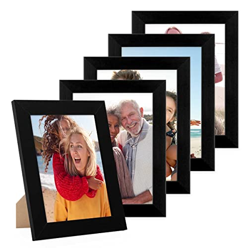 PHOTOLINI Bilderrahmen 15x20 Schwarz Holz MDF, 5er Set breite Bilderrahmen schwarz 20x15, Picture Frame mit Acrylglas, Bilderrahmen 15 x 20 cm zum Aufhängen & Aufstellen, Rahmen 15x20 mit Zubehör PHOTOLINI Bilderrahmen 15x20 Schwarz Holz MDF, 5er Set breite Bilderrahmen schwarz 20x15, Picture Frame mit Acrylglas, Bilderrahmen 15 x 20 cm zum Aufhängen & Aufstellen, Rahmen 15x20 mit Zubehör von PHOTOLINI