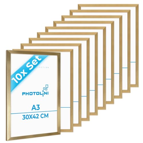 PHOTOLINI Bilderrahmen A3 Holz MDF Gold, 10er Set A3 Bilderrahmen 30x42 Holz MDF, DIN A 3 Rahmen mit Acrylglas, Picture Frame 42x30 zum Aufhängen, Rahmen 42 x 30 mit Zubehör für DINA3 Fotos & Poster PHOTOLINI Bilderrahmen A3 Holz MDF Gold, 10er Set A3 Bilderrahmen 30x42 Holz MDF, DIN A 3 Rahmen mit Acrylglas, Picture Frame 42x30 zum Aufhängen, Rahmen 42 x 30 mit Zubehör für DINA3 Fotos & Poster von PHOTOLINI