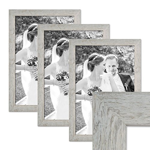 PHOTOLINI Bilderrahmen A3 30x42 cm Holz Grau, 3er Set Echtholz-Rahmen rustikal, Strandhaus, Made in Germany, Echtglas, zum Aufhängen, extra Zubehör - Treibholzlook mit einem Hauch Küstenflair PHOTOLINI Bilderrahmen A3 30x42 cm Holz Grau, 3er Set Echtholz-Rahmen rustikal, Strandhaus, Made in Germany, Echtglas, zum Aufhängen, extra Zubehör - Treibholzlook mit einem Hauch Küstenflair von PHOTOLINI