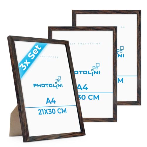 PHOTOLINI Bilderrahmen A4 Holz MDF Eiche Dunkel, 3er Set DIN A4 Bilderrahmen 21x30 cm, bruchsicheres Acrylglas, picture frame zum Aufhängen & Aufstellen, Rahmen mit Zubehör 30x21 für Fotos & Poster PHOTOLINI Bilderrahmen A4 Holz MDF Eiche Dunkel, 3er Set DIN A4 Bilderrahmen 21x30 cm, bruchsicheres Acrylglas, picture frame zum Aufhängen & Aufstellen, Rahmen mit Zubehör 30x21 für Fotos & Poster von PHOTOLINI