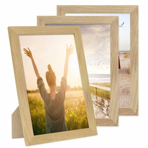 PHOTOLINI Bilderrahmen A4 Holz Eiche Set, 3er Set breite DIN A4 Bilderrahmen Holz 21x30, bruchsicheres Acrylglas, picture frame zum Aufhängen & Aufstellen, Bilder Rahmen 30x21 mit Zubehör PHOTOLINI Bilderrahmen A4 Holz Eiche Set, 3er Set breite DIN A4 Bilderrahmen Holz 21x30, bruchsicheres Acrylglas, picture frame zum Aufhängen & Aufstellen, Bilder Rahmen 30x21 mit Zubehör von PHOTOLINI