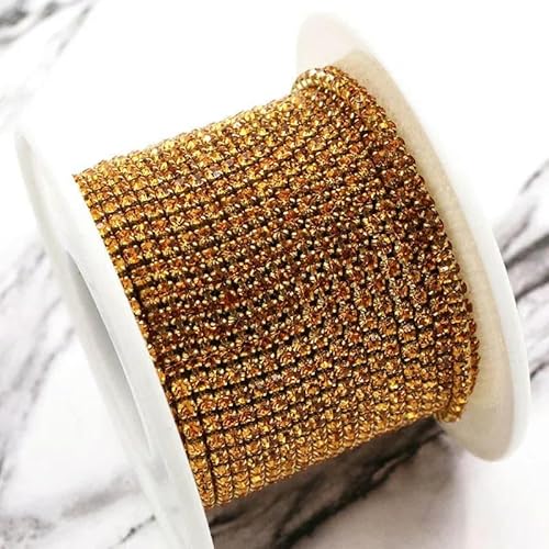 Bekleidungszubehör 10 Yards/Rolle Glaskristall-Strasssteine, goldene Klauenbecherkette, Strassbesatz, DIY-Kleidung/Taschen/Hochzeitskleid, Goldgelb, SS8, 1 Rolle von QOVBD
