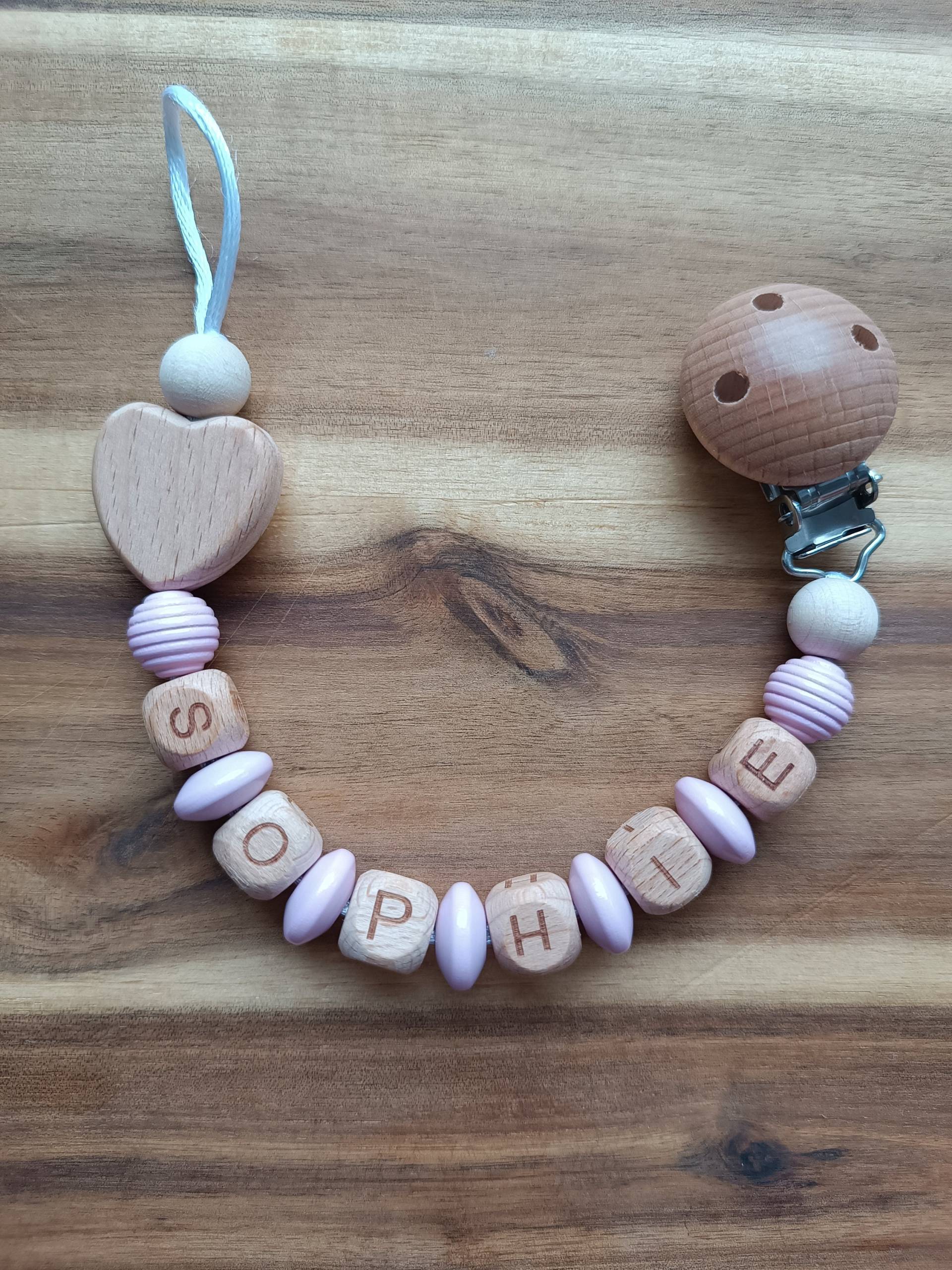 Personalisierte Schnullerkette Mit Herz-Perle Personalisierte Schnullerkette Mit Herz-Perle von Schnulliebe
