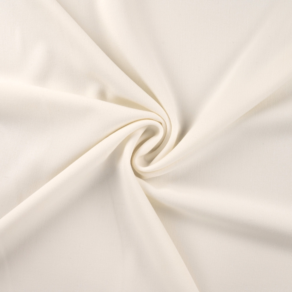 Bi Stretch Gabardine uni, wollweiß Bi Stretch Gabardine uni, wollweiß von Stoffe Hemmers