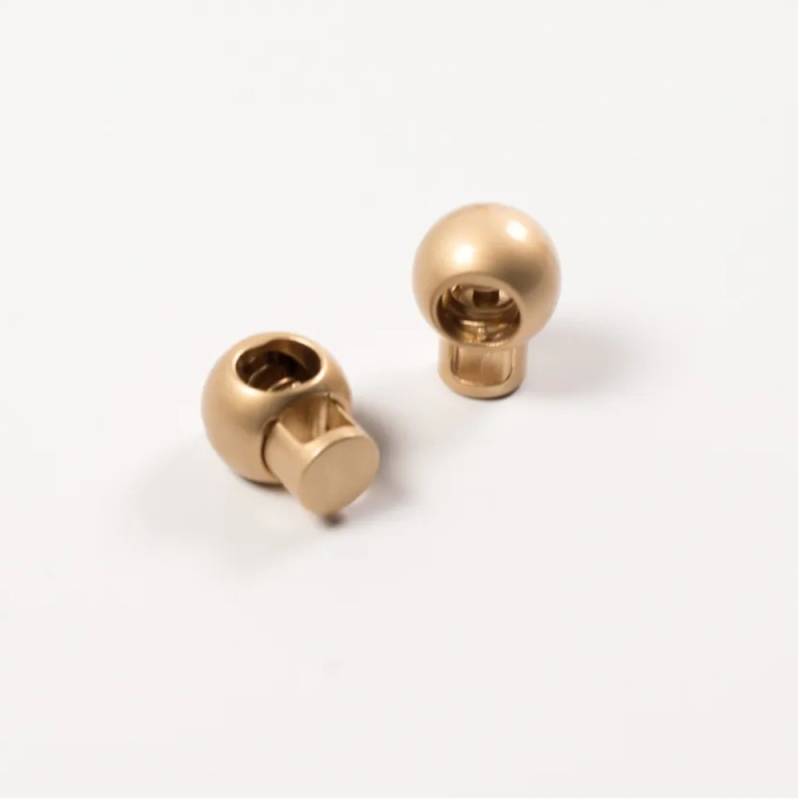 Metall Kordelstopper, blassgold von Stoffe Hemmers