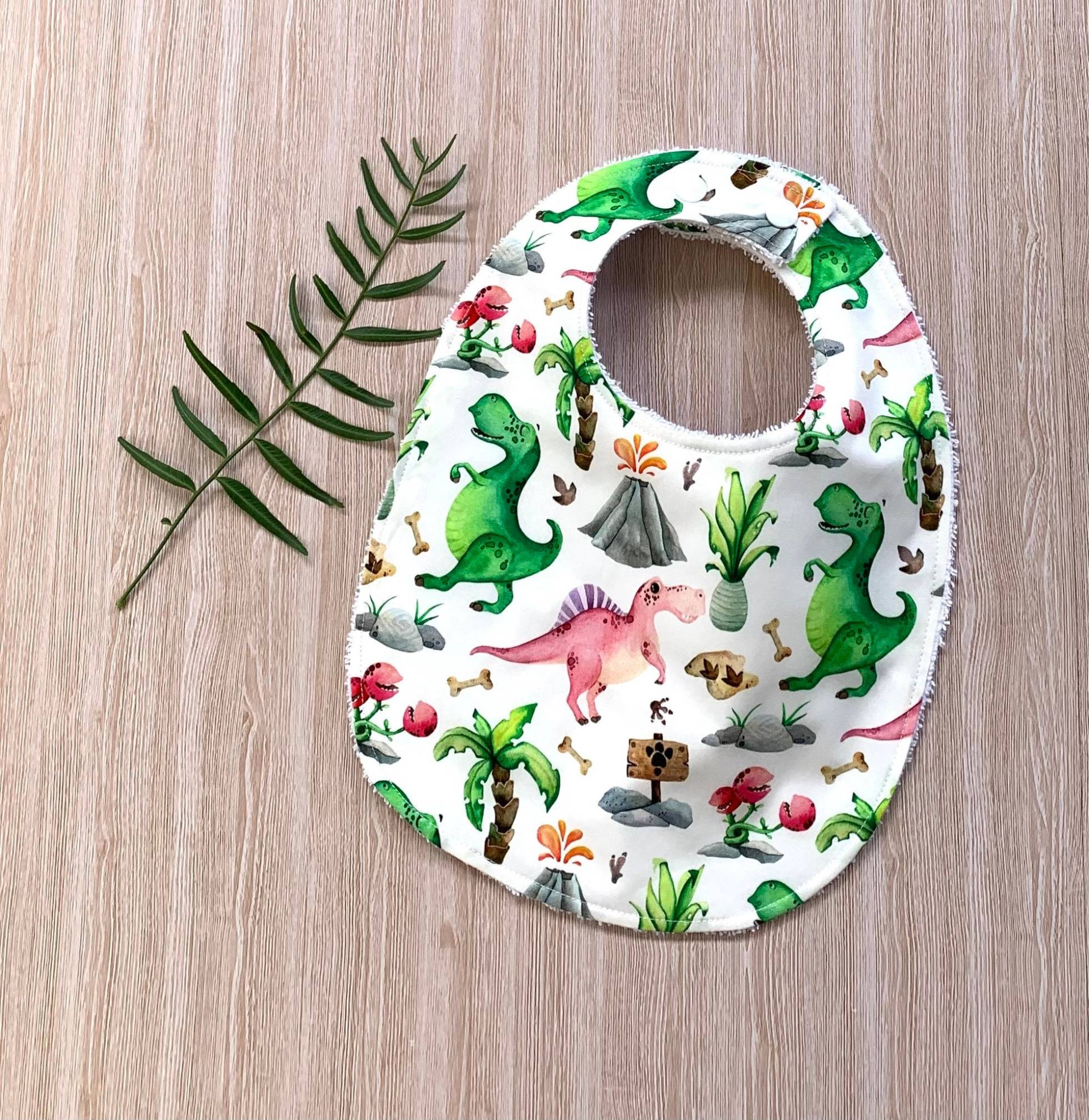 Lätzchen Baby Und Kindertrage, Dinosaurier Mit Druckknöpfen Frottee Lätzchen Baby Und Kindertrage, Dinosaurier Mit Druckknöpfen Frottee von TwoBlackRabbits