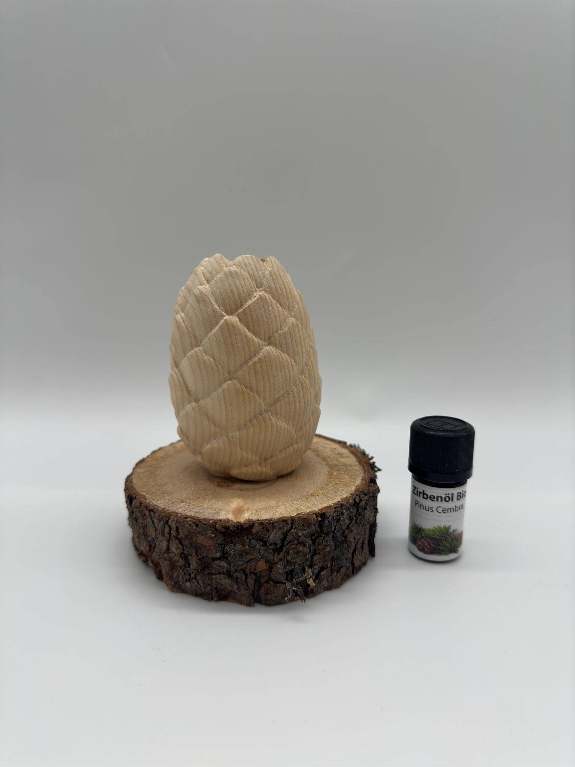 Zirbenzapfen Aus Tiroler Zirbenholz Auf Zirbenast Mit Bohrung Und 5Ml Zirbenöl Zirbenzapfen Aus Tiroler Zirbenholz Auf Zirbenast Mit Bohrung Und 5Ml Zirbenöl von Zirbenvielfalt