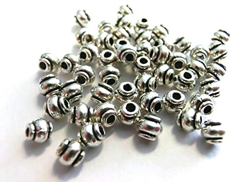 50 Spacer Rondell Farbe antiksilber Großlochperle Modulperle Metall (4,2x4mm #S257) von beadsvision