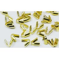Endkappen für Bänder bis 2,5 mm Goldfarben / 100 Stück von inwaria