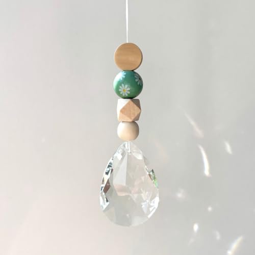Handgemachter Sonnenfänger Kristall 50 mm – Fensterdeko Gänseblümchen grün mit verschiedenen Holzperlen Handgemachter Sonnenfänger Kristall 50 mm – Fensterdeko Gänseblümchen grün mit verschiedenen Holzperlen von møij